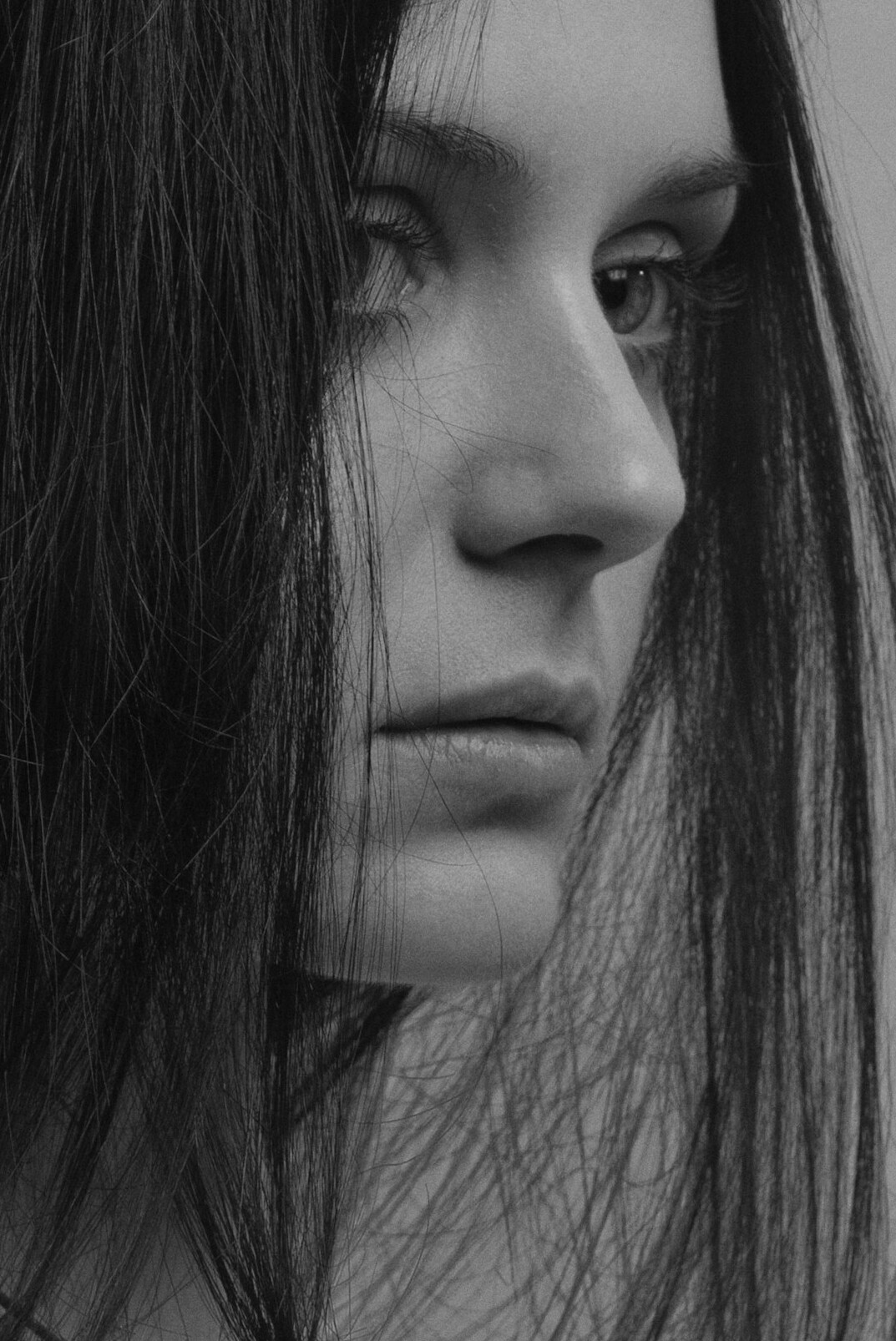 Portrait of a woman with long dark hair