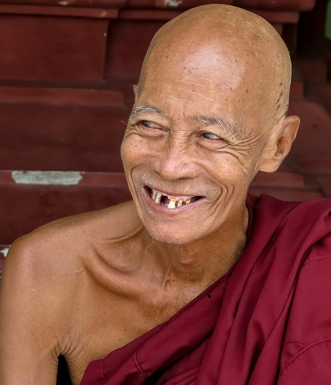 Portrait of a smiling man with short hair